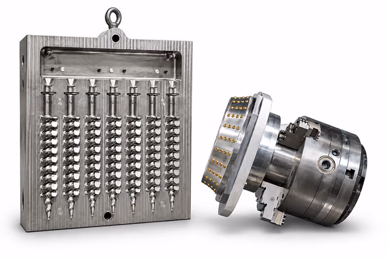 Large precision-machined metal component isolated on white, showcasing complex multi-axis CNC machining.