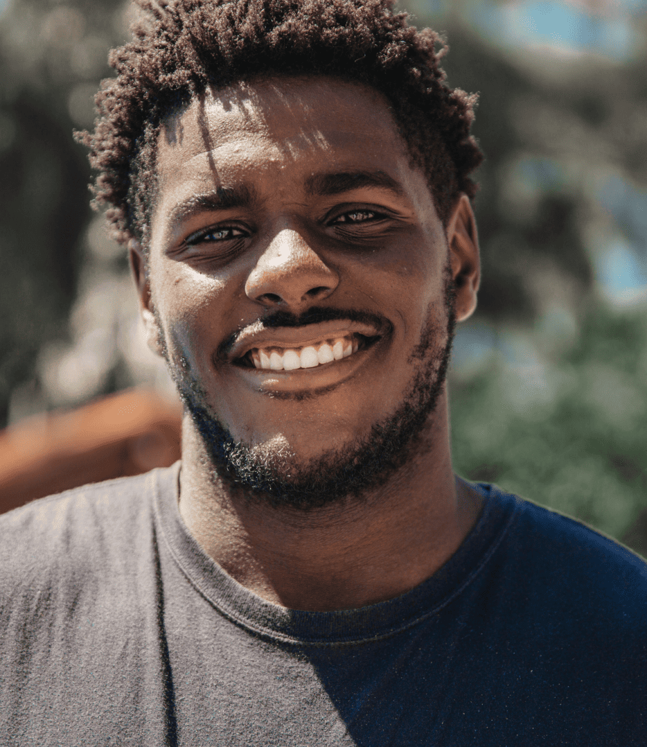 A man smiling into the camera