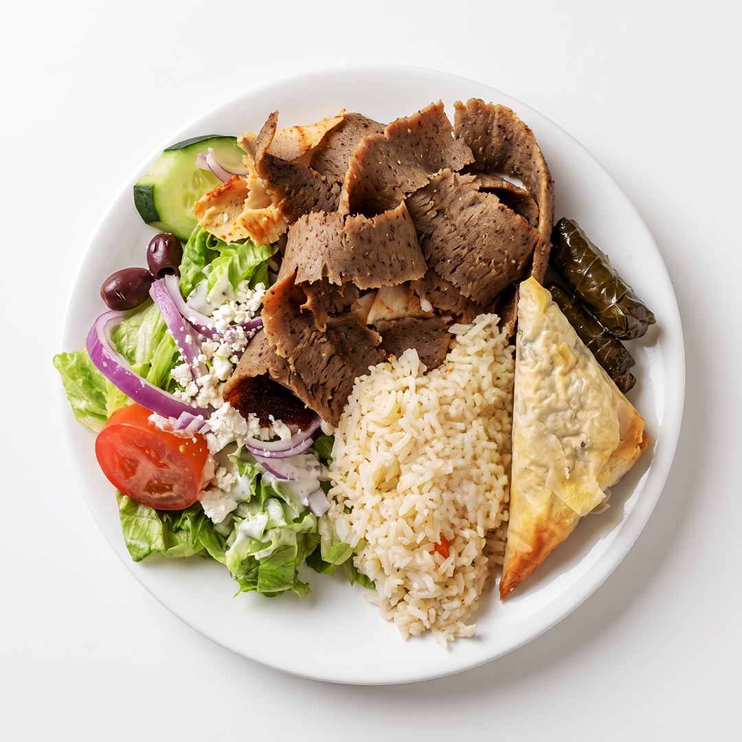 Tino's Greek plate with chicken and fresh sides