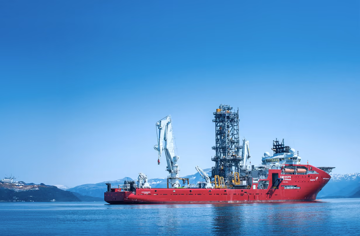 Akastor portfolio company AKOFS Offshore vessel at a Norwegian fjord