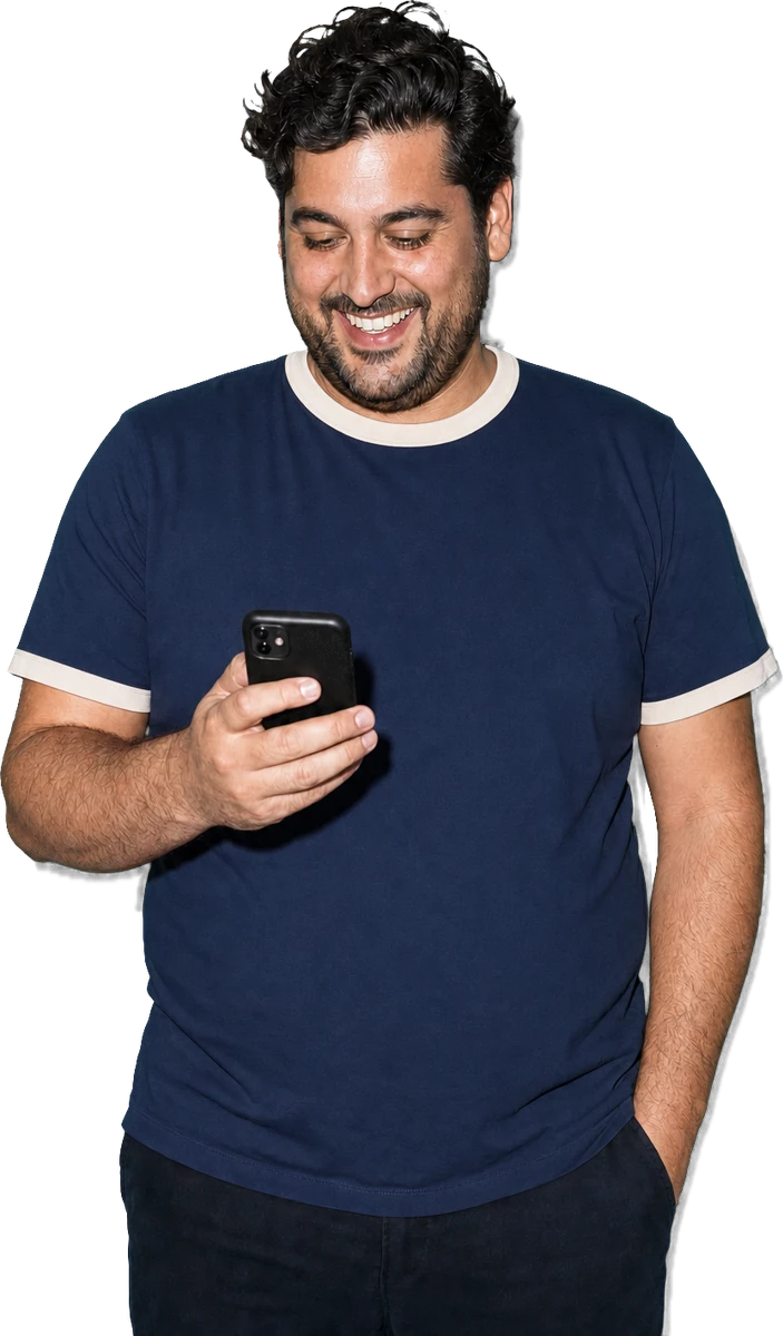 A Science and Co member taking the online intake on his phone