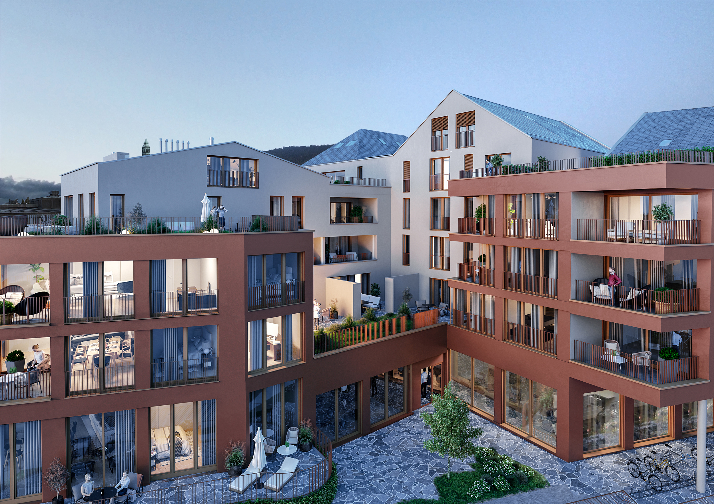 Moderne Wohngebäude mit Balkonen, Innenhof mit Bäumen und Menschen auf Terrassen und Balkonen.