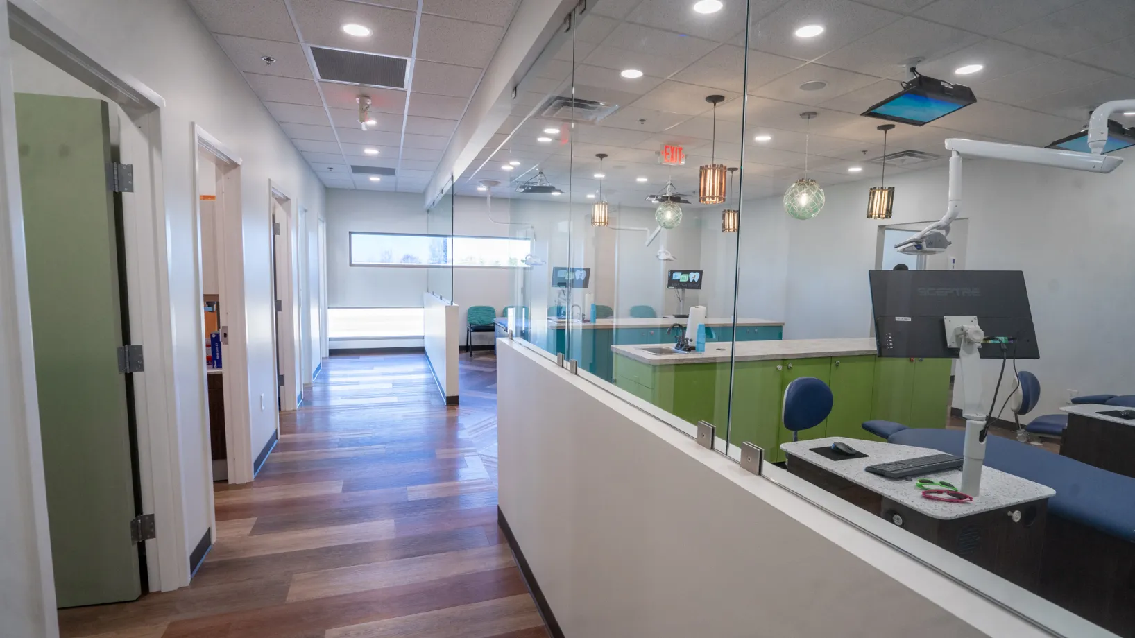 A view of a medical office through a glass wall.