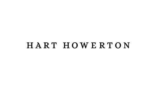 Black background with the phrase 'HEART MOVES MIND' faintly visible in dark gray text across the center.