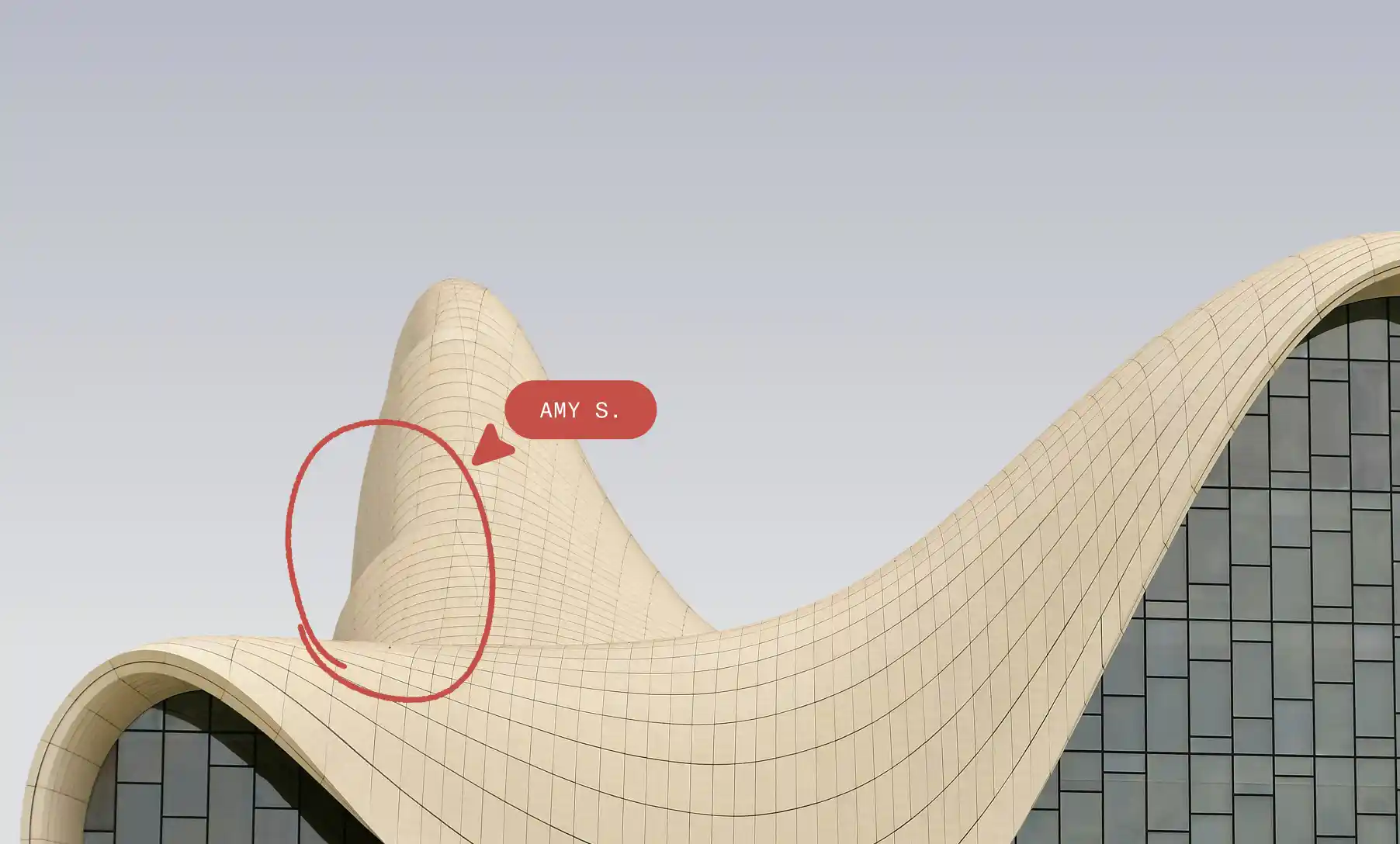 Curved beige architectural structure with grid pattern panels and large glass windows, featuring red annotation circle and arrow labeled 'AMY S.' pointing to a section near the peak.