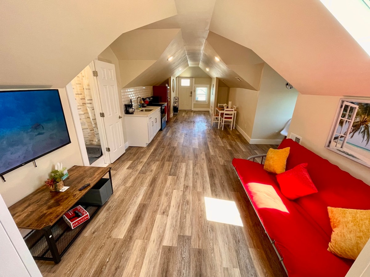 Sun-Kissed Elegance: Airy Living Space, Panoramic Sky Windows, 60" TV, & Deluxe Kitchen