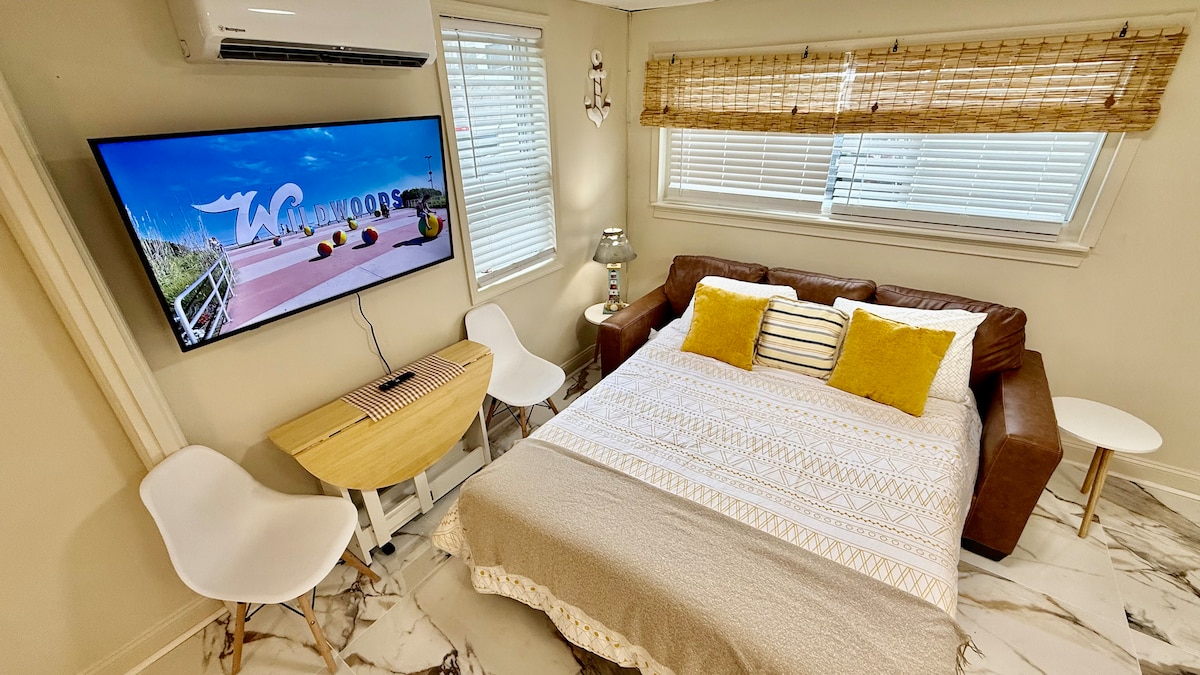 The queen pull-out couch is ready for the extra guest for a fee