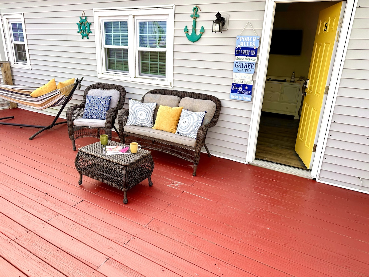 Your Private Deck Beckons with a Tranquil Hammock for Blissful Summer Evenings