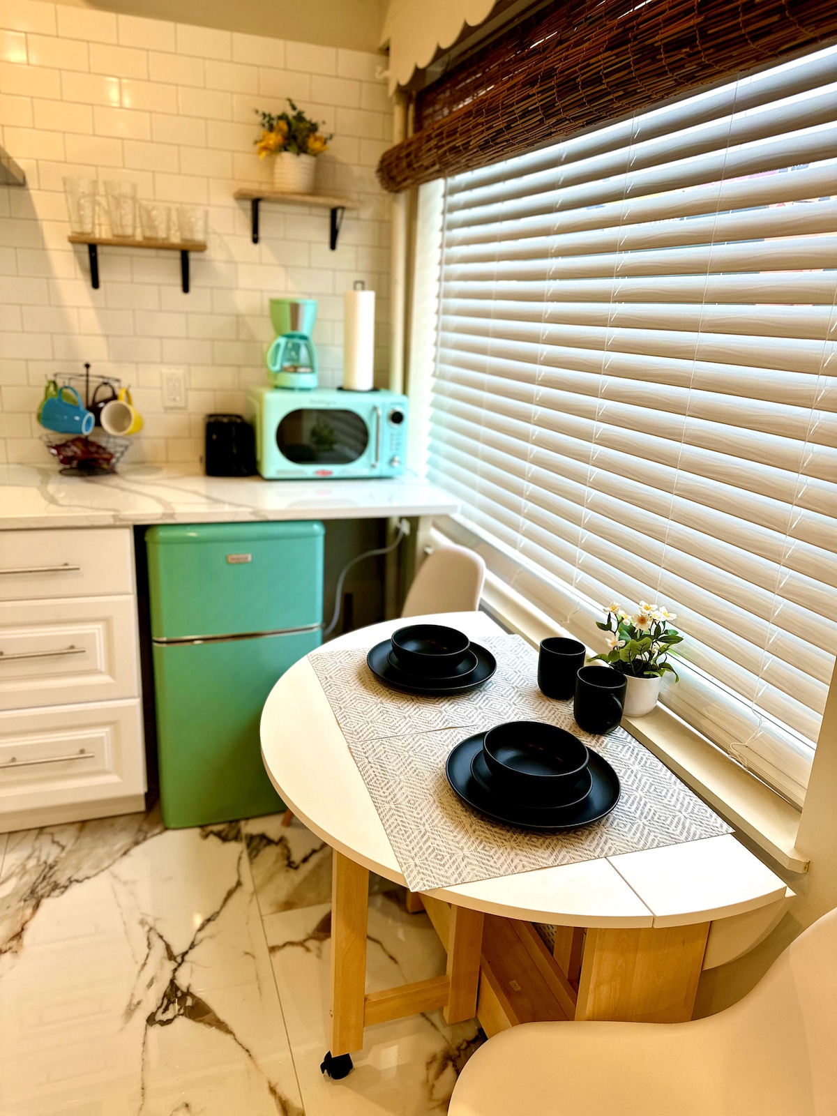 Full kitchen with electric cooktop with foldable table
