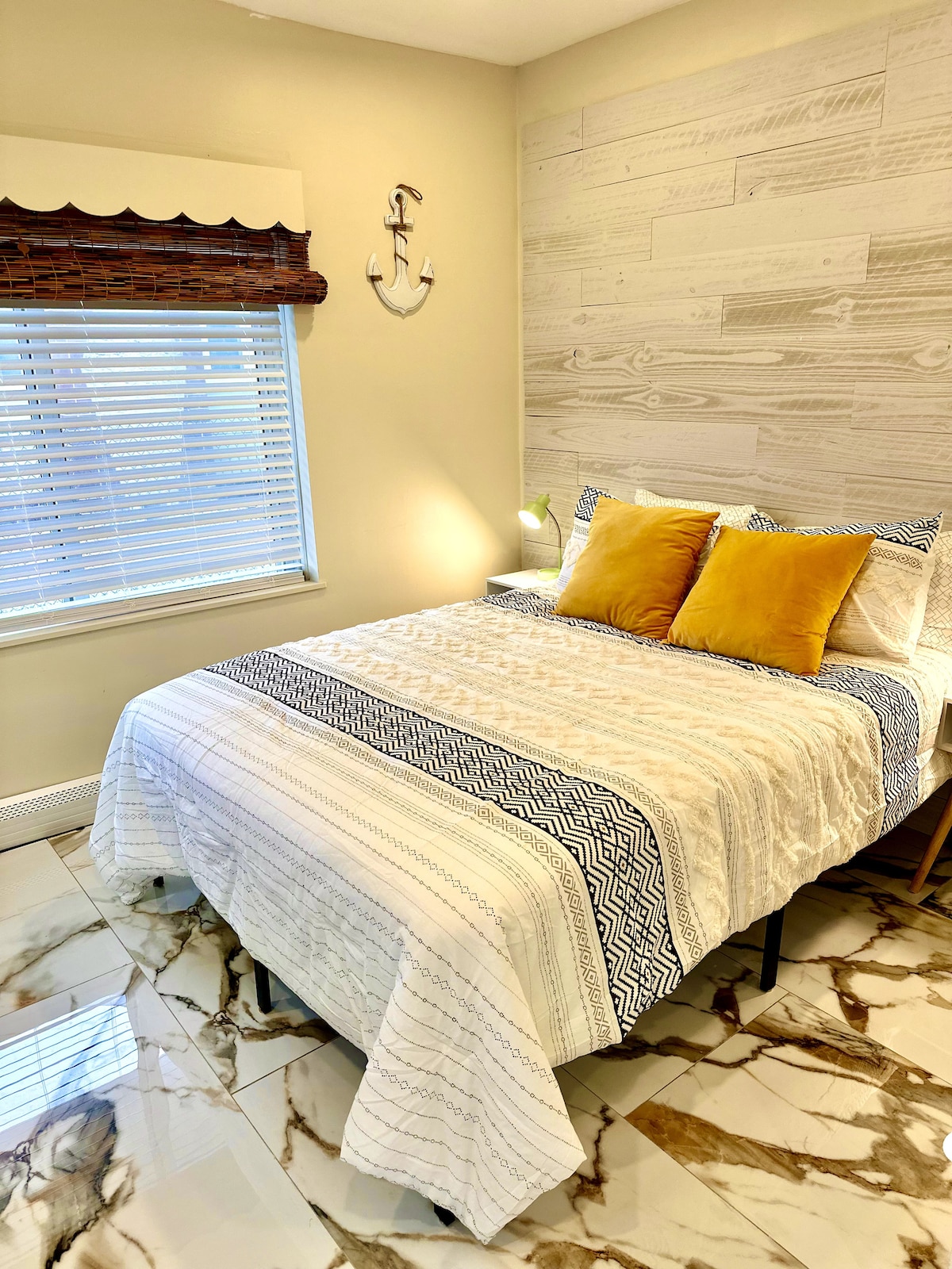 Indulge in a restful night's sleep on our luxurious queen bed, complete with high-quality, cozy bedding