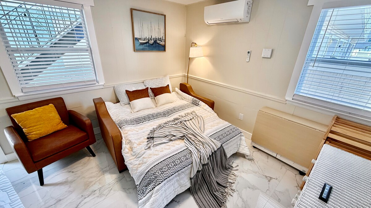 Folding couch that converts into a comfortable queen-size bed.