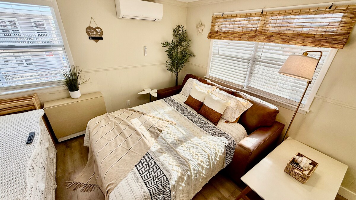 Folding couch that converts into a comfortable queen-size bed.