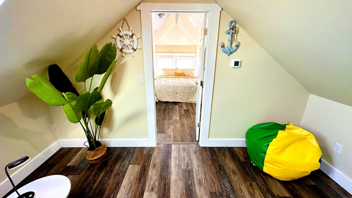 Enjoy luxury and comfort in our bright living room, boasting a cozy couch, and large sky windows that fill the space wit