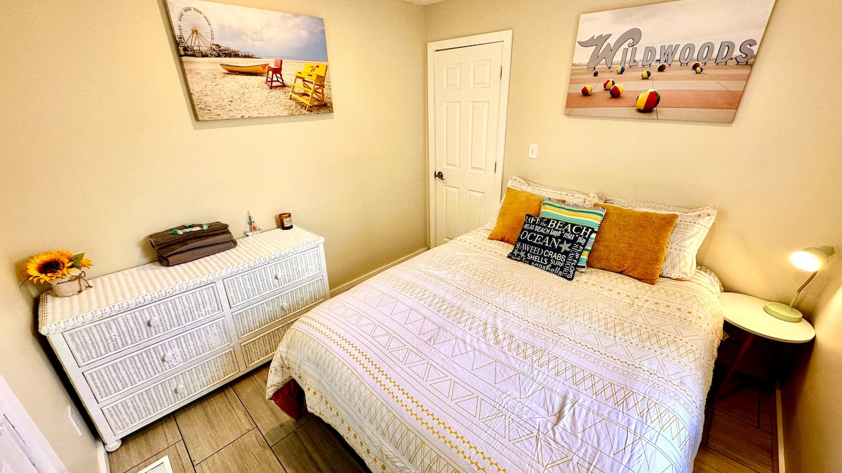 Queen bed with plush comfort, featuring access to a private porch