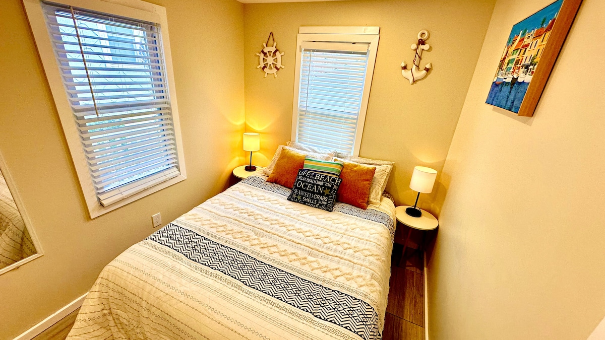 Queen-size bed with premium linens and a high-definition TV for an enhanced relaxation experience.