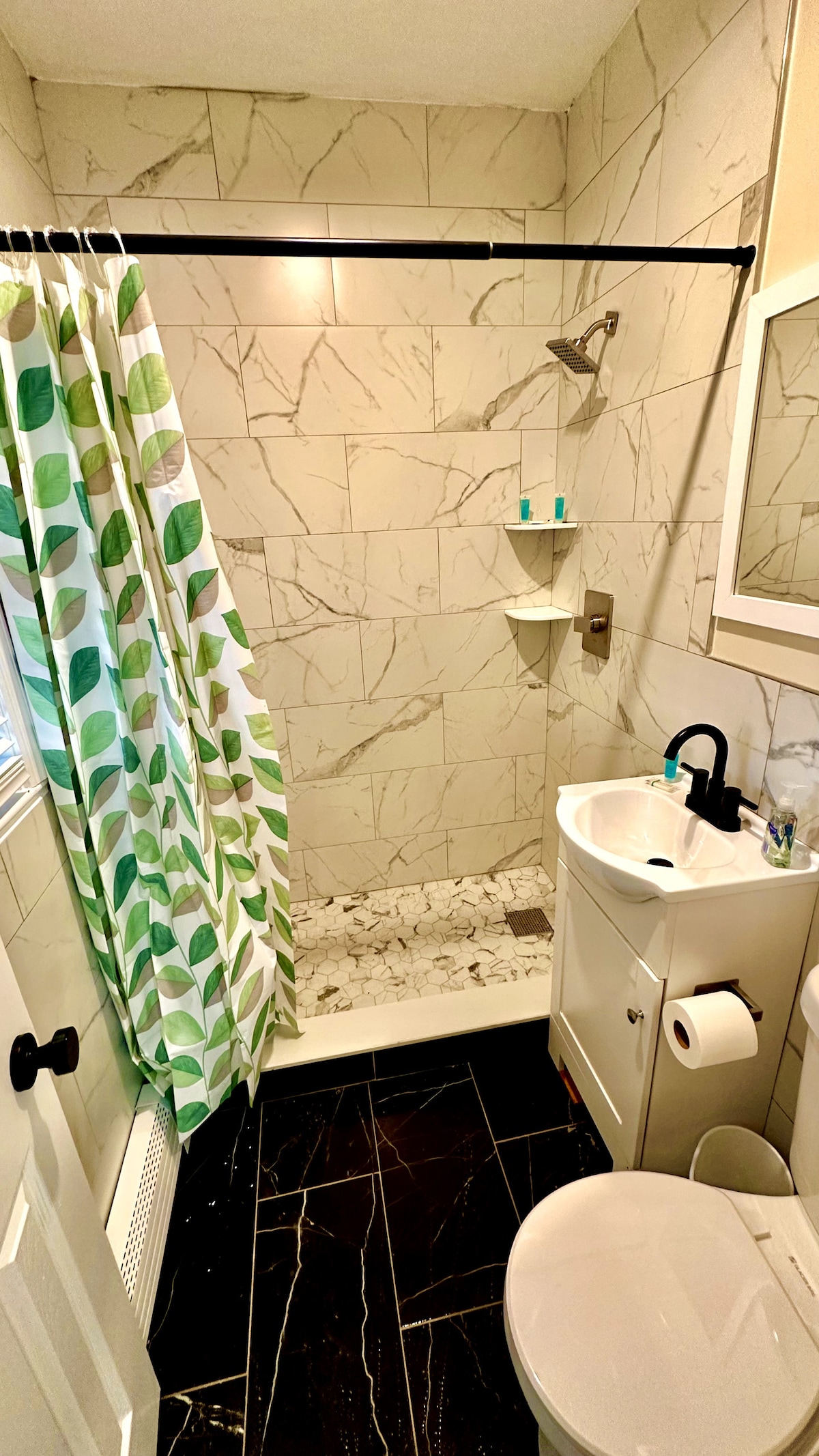 Relax in our complete bathroom, featuring a refreshing shower and all the essentials for your comfort