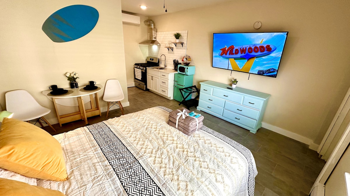 Enjoy plush bedding on a queen bed, along with a 65-inch Smart TV for entertainment. Revel in the spacious cleanliness o