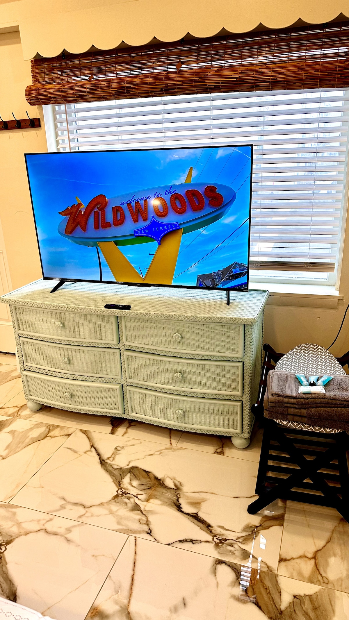 Enjoy entertainment on our 55-inch Smart TV in this inviting, cozy space