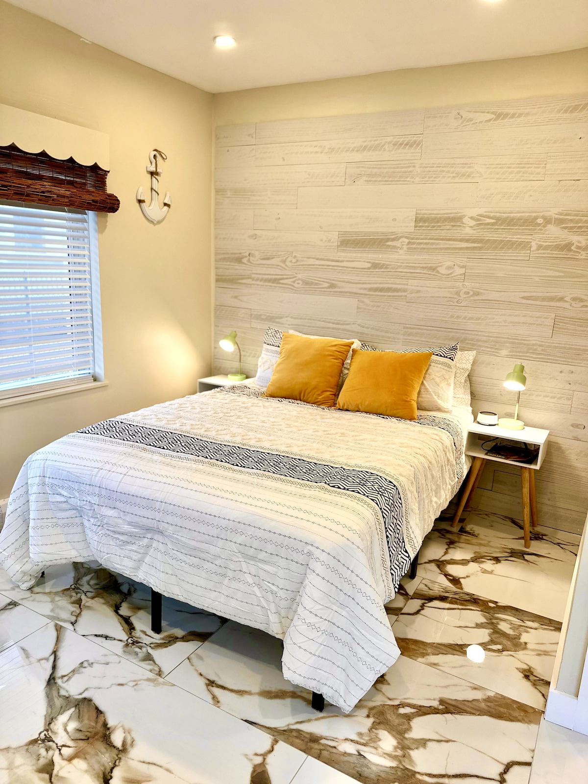 Indulge in a restful night's sleep on our luxurious queen bed, complete with high-quality, cozy bedding