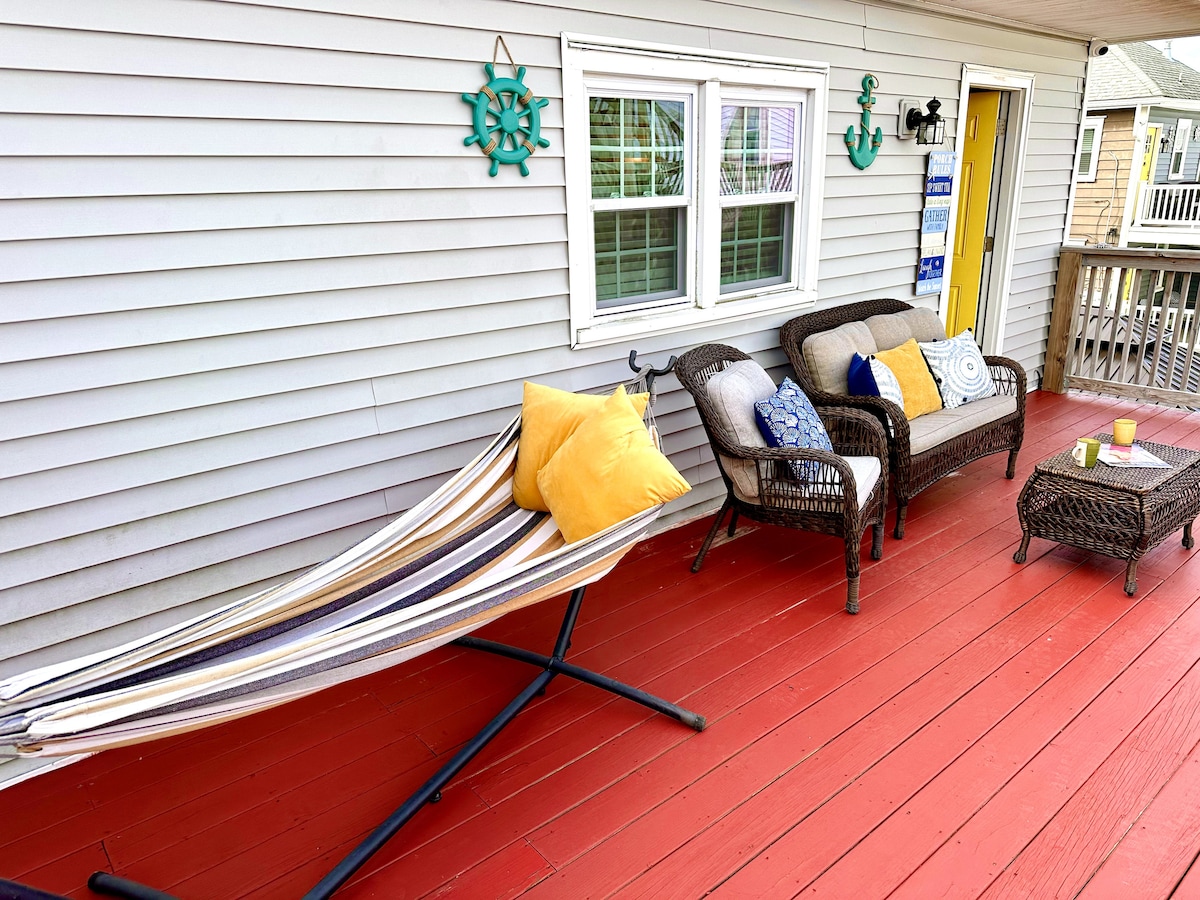 Your Private Deck Beckons with a Tranquil Hammock for Blissful Summer Evenings