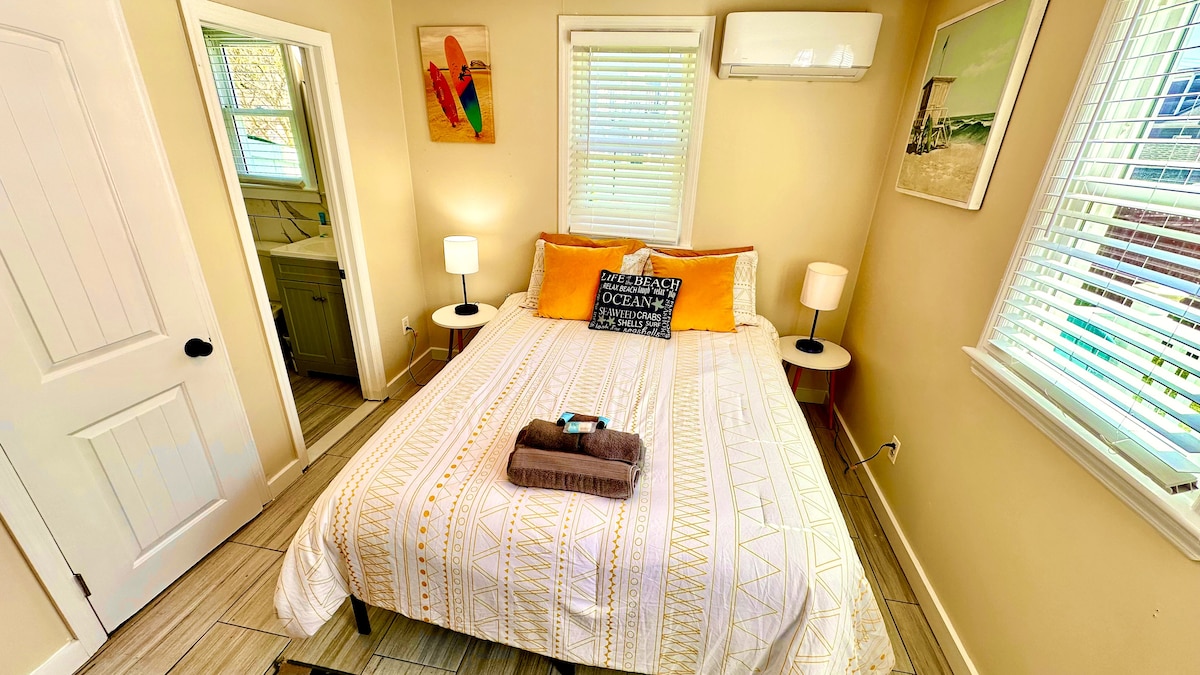Cozy Queen Bedroom with Mini-Fridge, Drip Coffee Maker & 50" TV