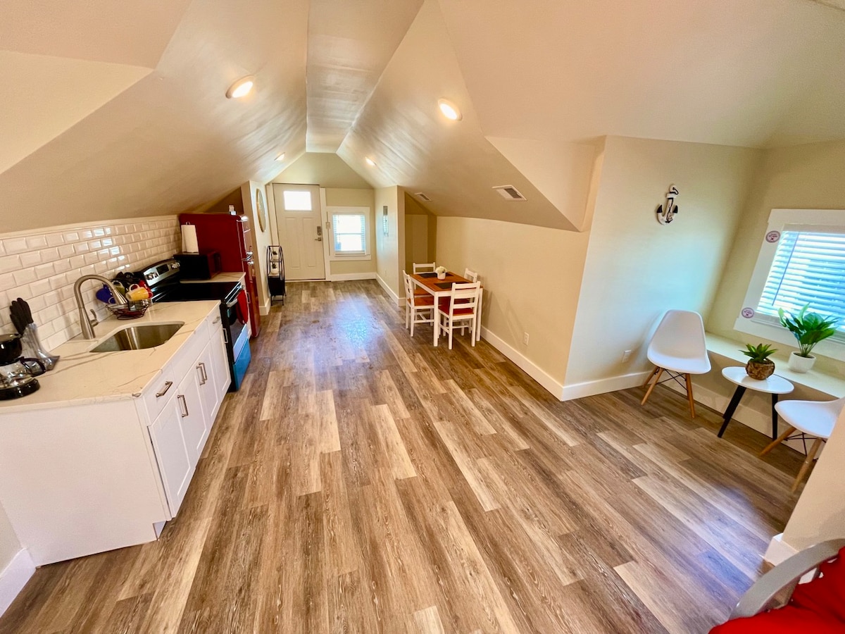 Sun-Kissed Elegance: Airy Living Space, Panoramic Sky Windows, 60" TV, & Deluxe Kitchen