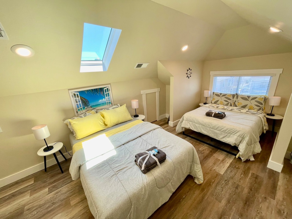 Dream Haven: Queen & Full Beds with Sky-View Windows for Blissful Rest