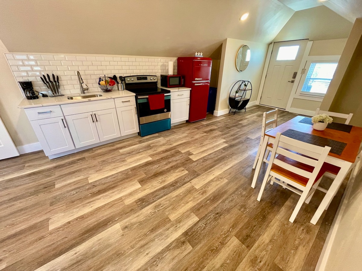 Sun-Kissed Elegance: Airy Living Space, Panoramic Sky Windows, 60" TV, & Deluxe Kitchen