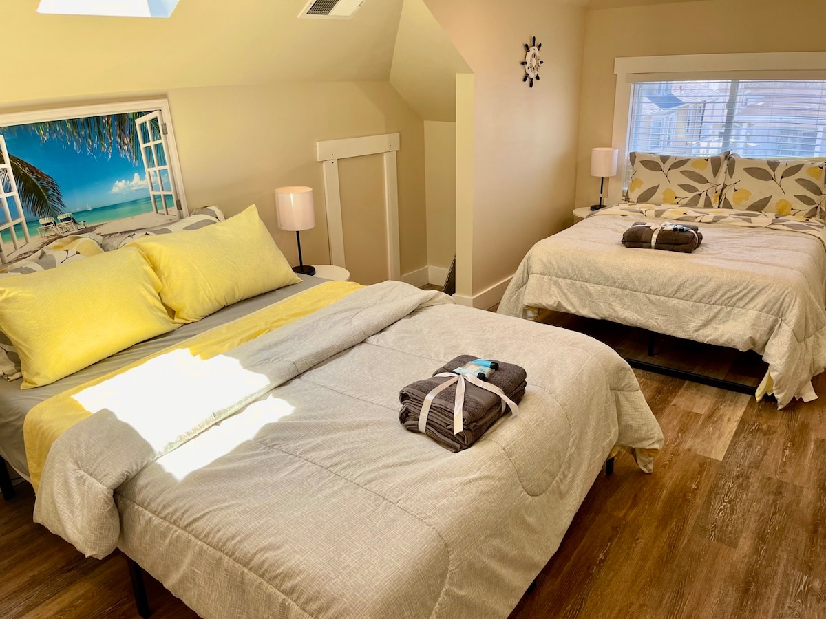 Dream Haven: Queen & Full Beds with Sky-View Windows for Blissful Rest