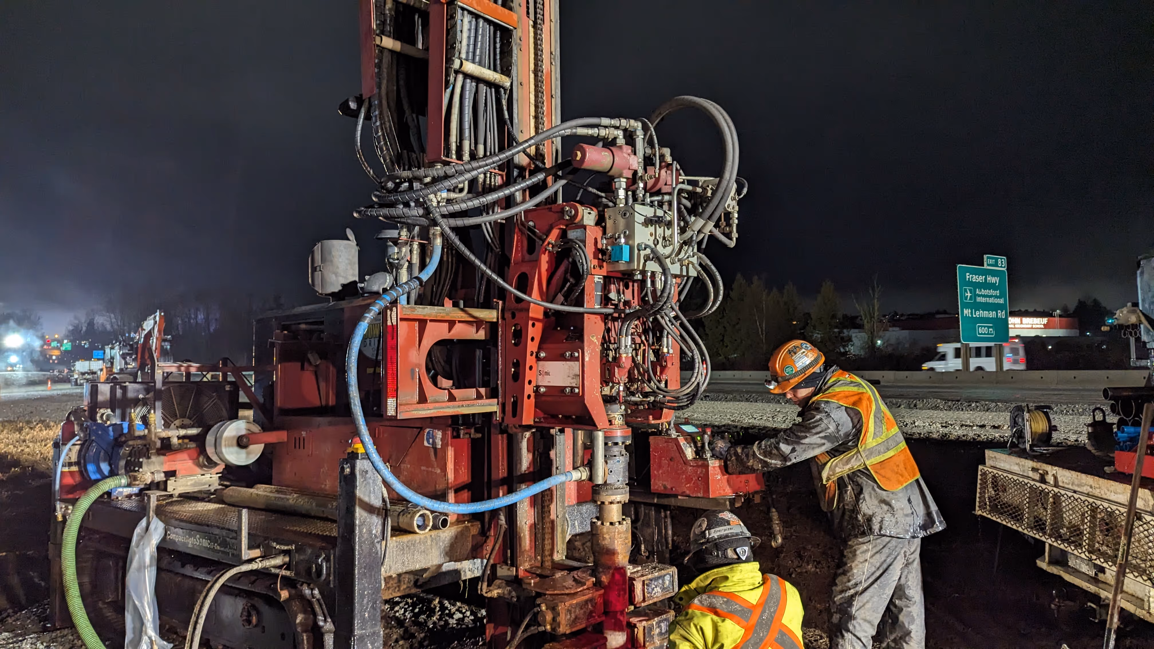 Construction drilling and monitoring work at night