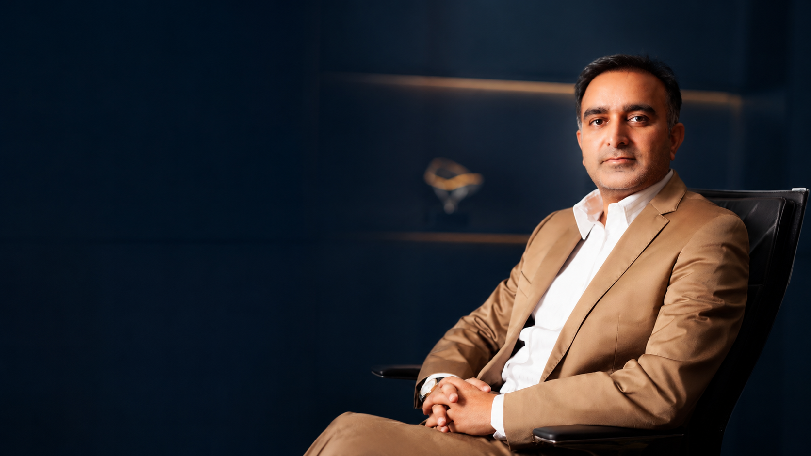 Chairman of SPEC Oil & Gas Technologies, seated in an office.