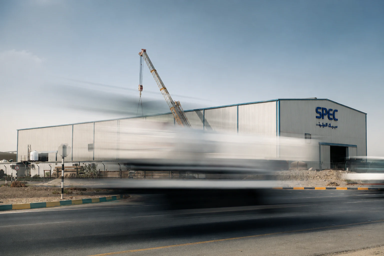 Welders working on a pressure vessel at SPEC's Jebel Ali fabrication facility