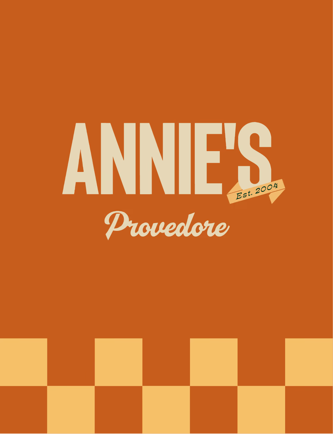 Annie's Provedore logo with yellow check pattern