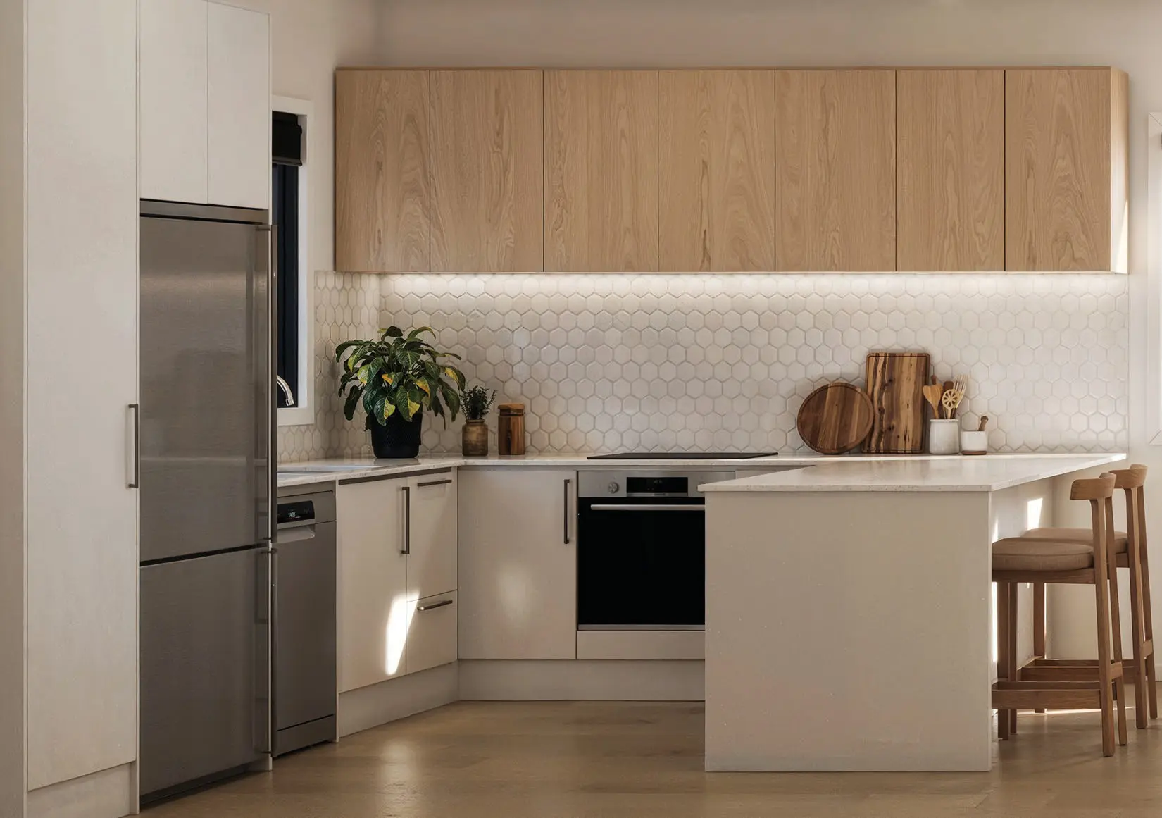 Kitchen with engineered stone benchtop in an Eden Group home at 9 Kesteven Avenue, Glendowie.