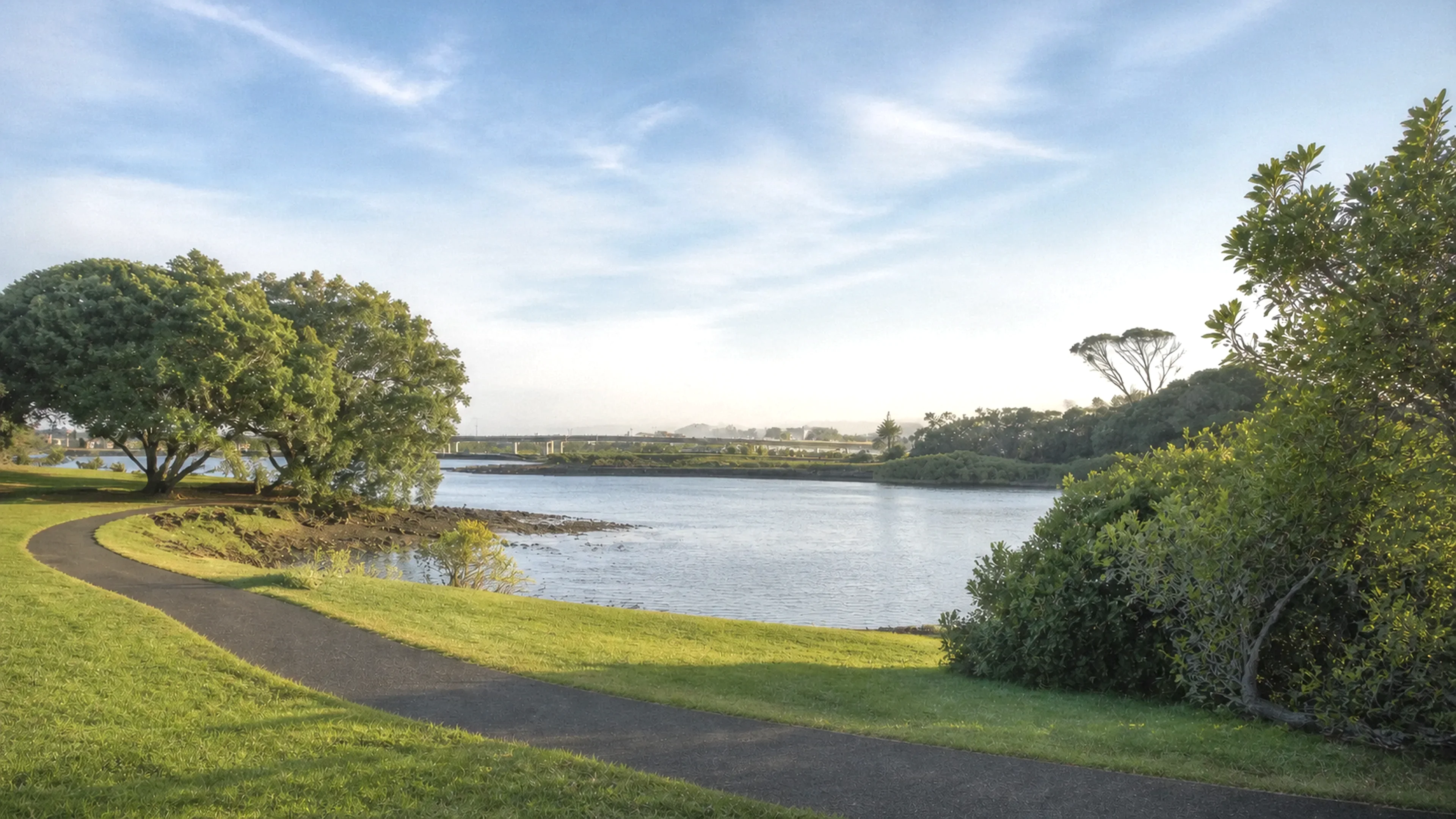 The Mangere Bridge waterfront at the end of the street, looking across the estuary