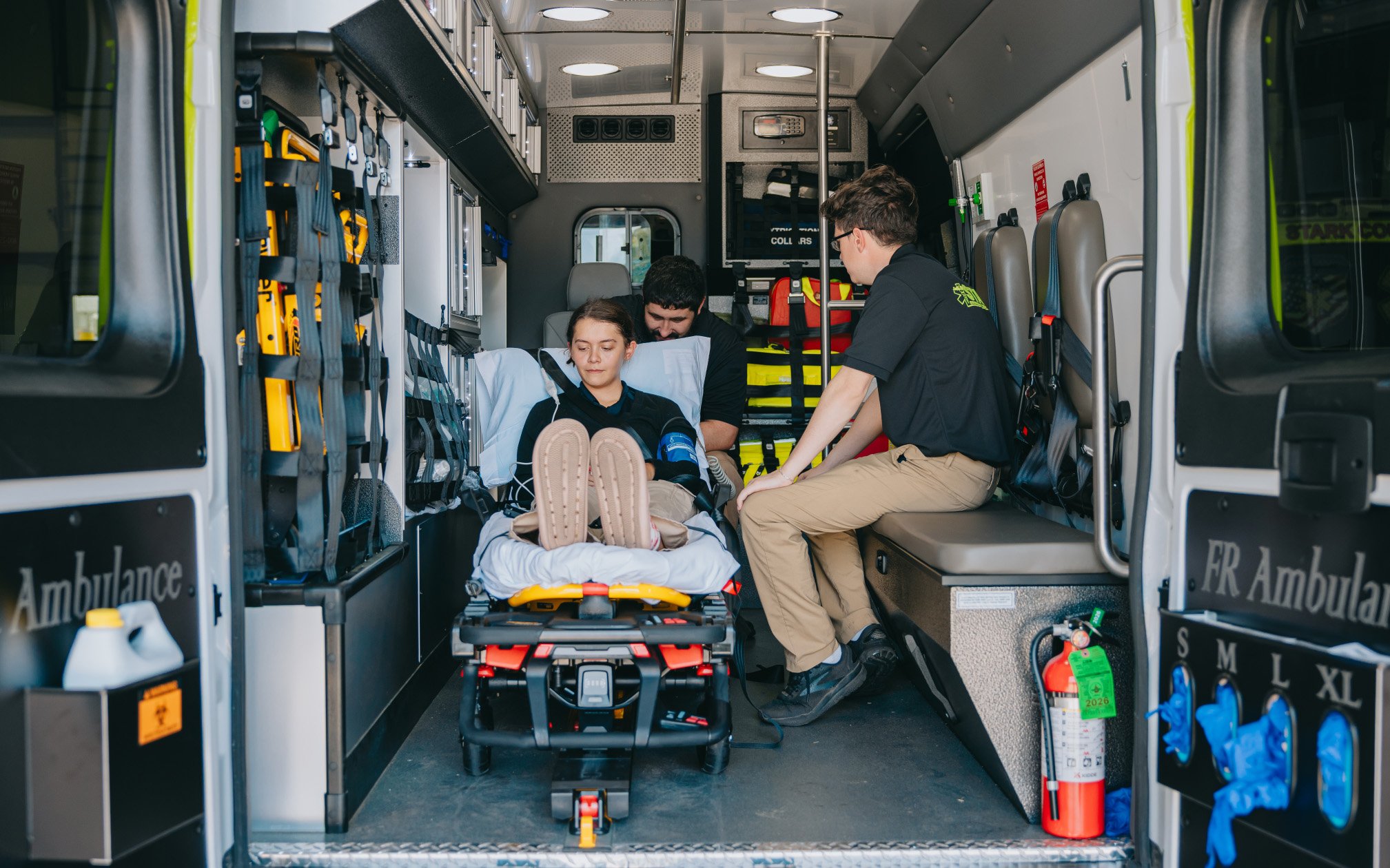 The interior of a Stark County Ambulance unit with the stretcher and equipment ready before a shift