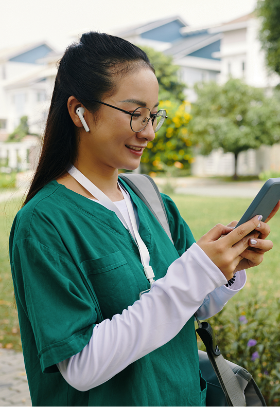 Nurse looking at phone