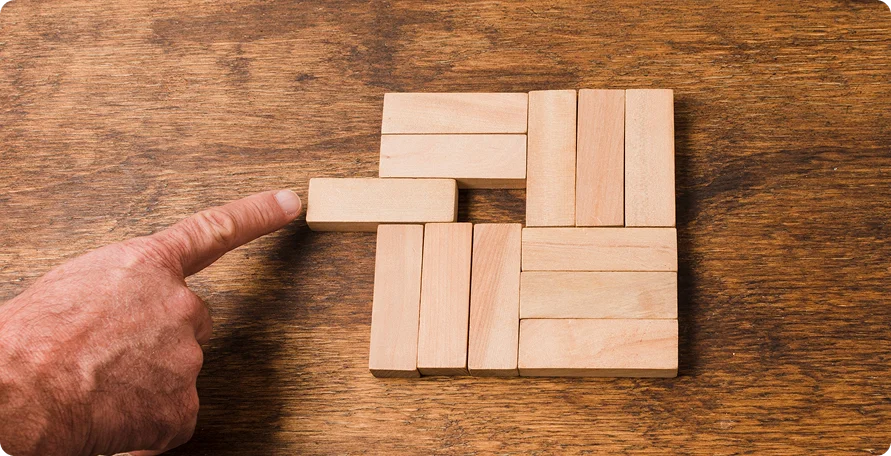 Wood block arrangement representing workflow and operating model design