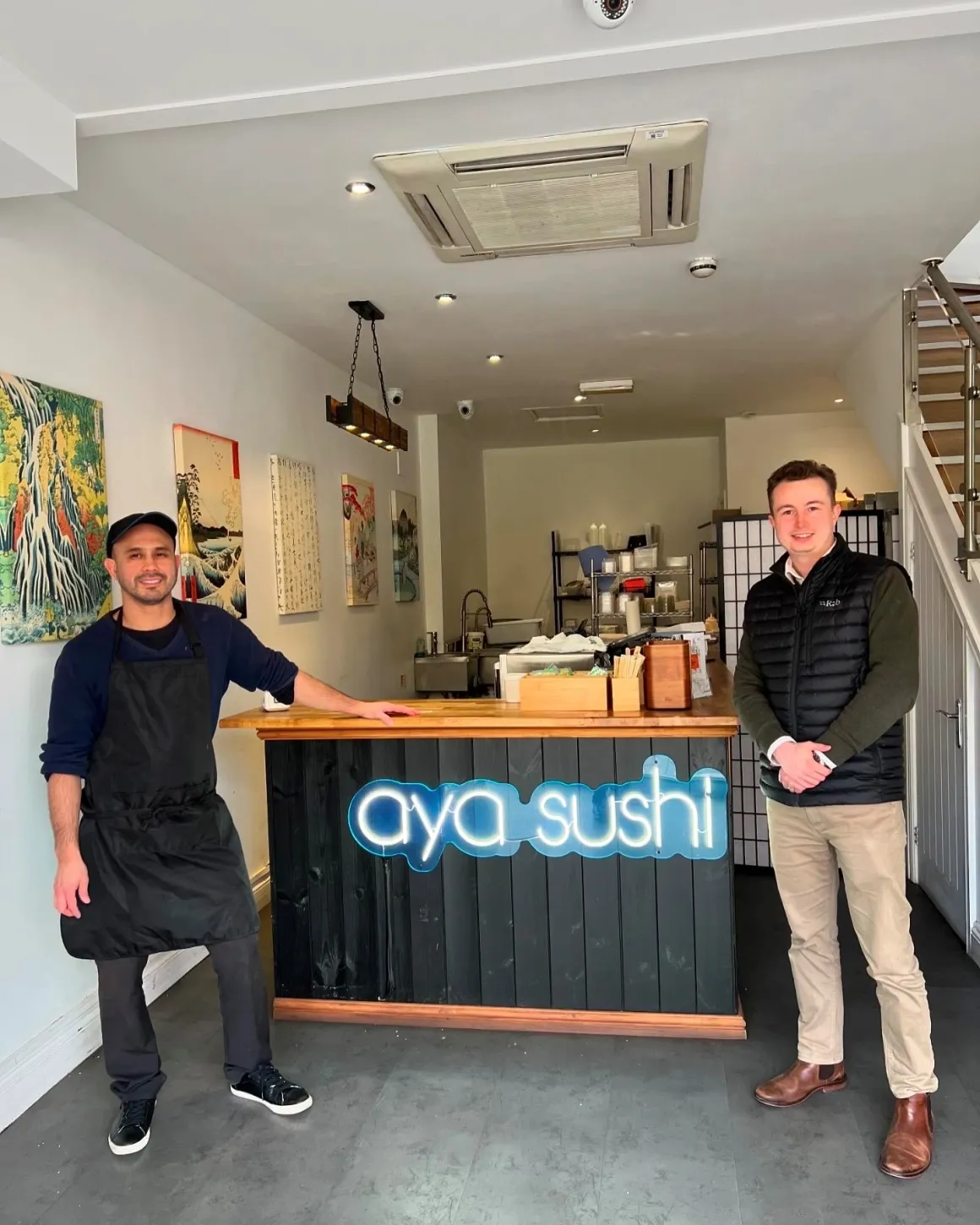 Jacob Follett meeting with a client
