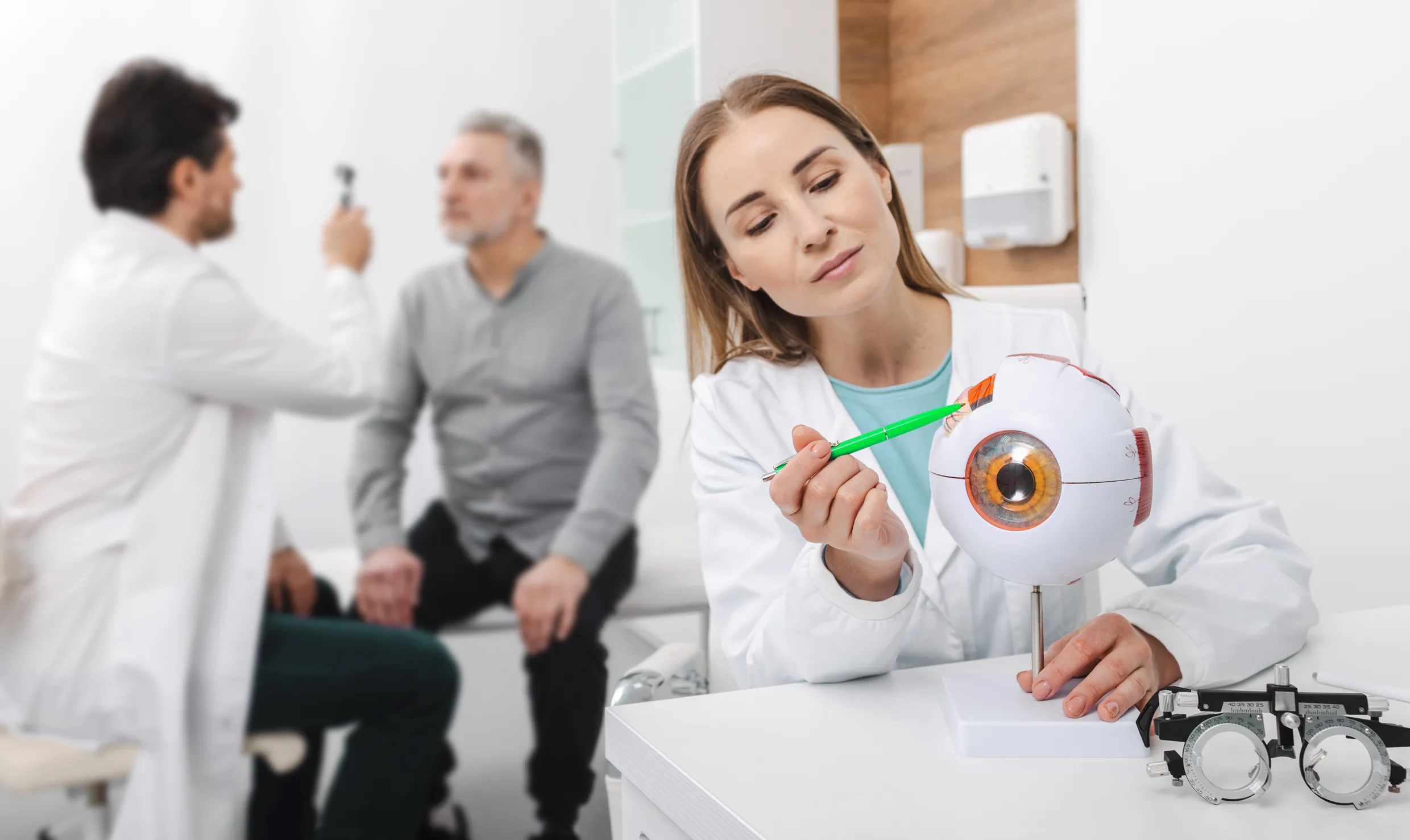 eye doctor and his client in the doctor's room