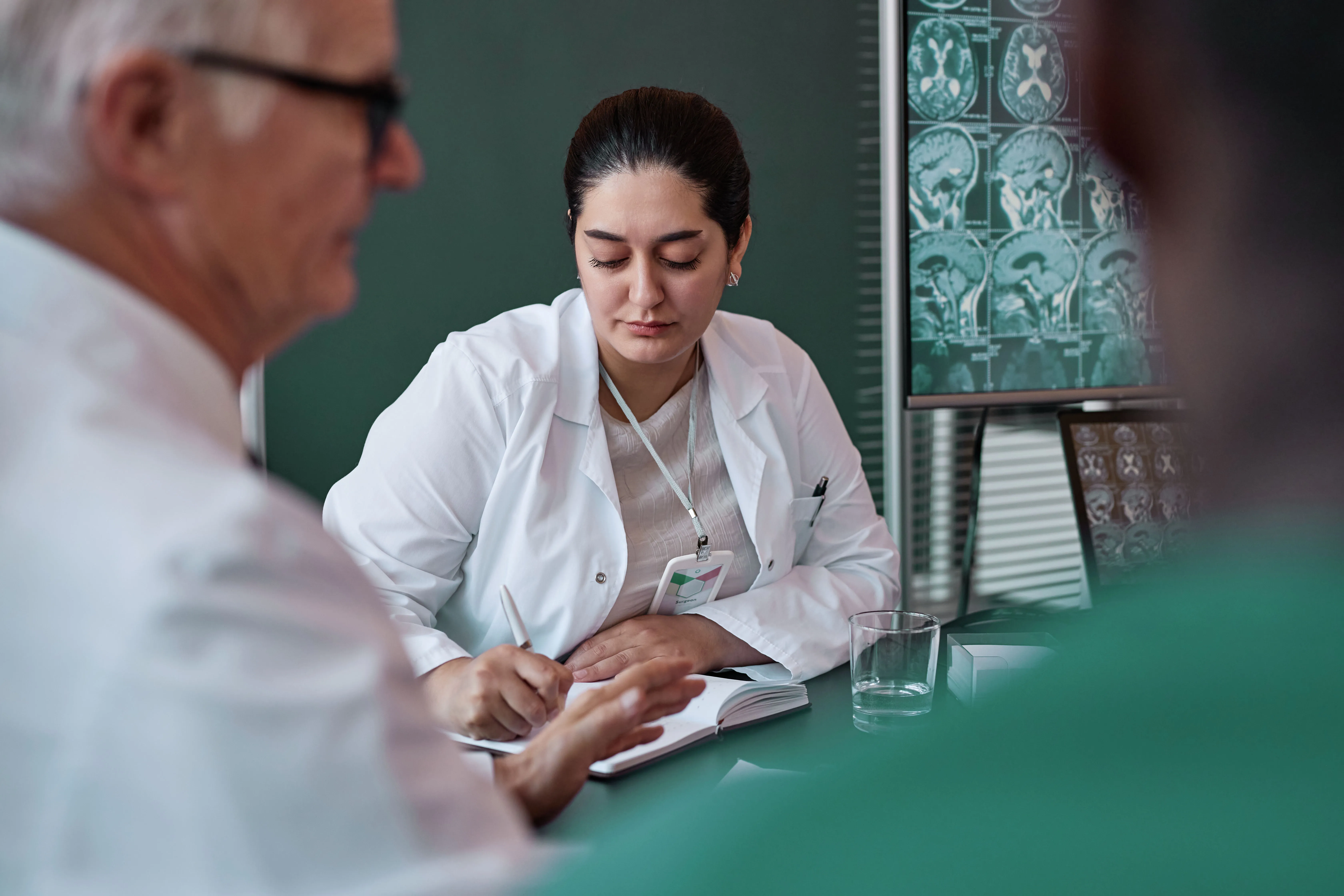 neurologist looking at her sheet