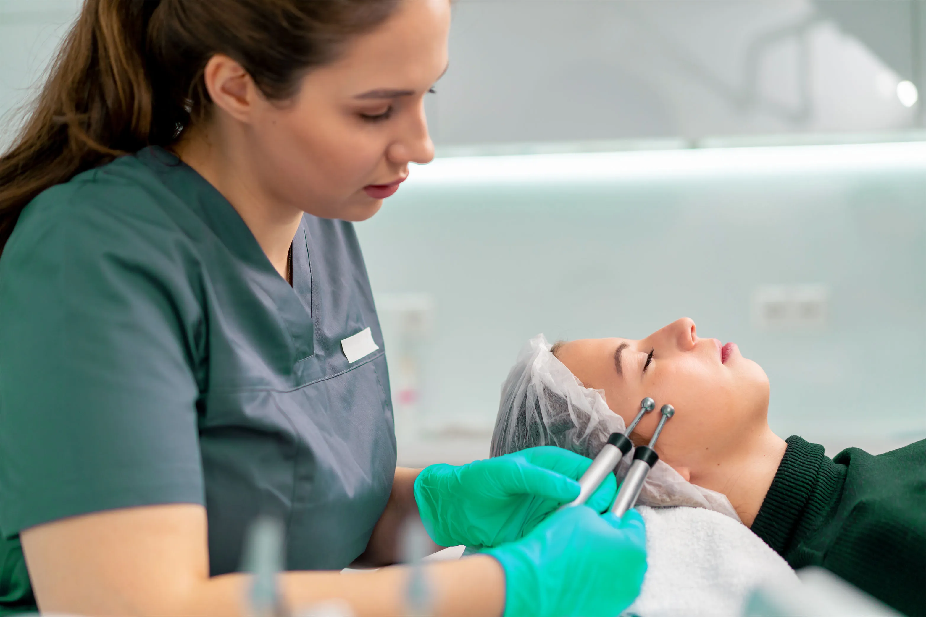 a female dermatologist with her female client