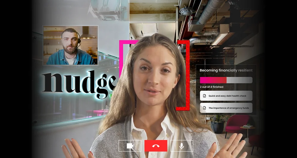 Video call interface with a woman in a gray sweater and white shirt speaking in the main frame and a man with a beard wearing a headset in a smaller frame, alongside a progress bar and checklist titled 'Becoming financially resilient' showing 2 out of 4 tasks finished.