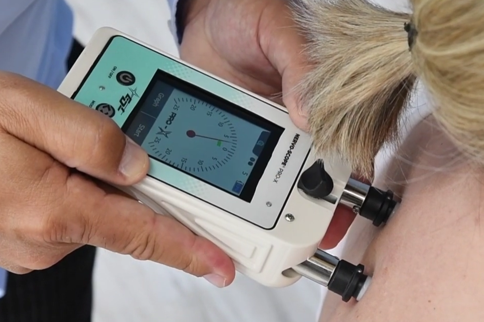 Nervo-Scope Pro-X paraspinal scan in use — Meridian, ID clinic]