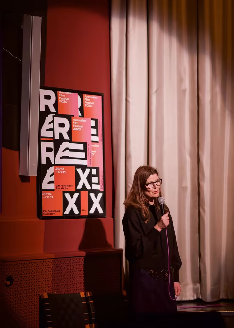 REX board member Marika Heideback on stage