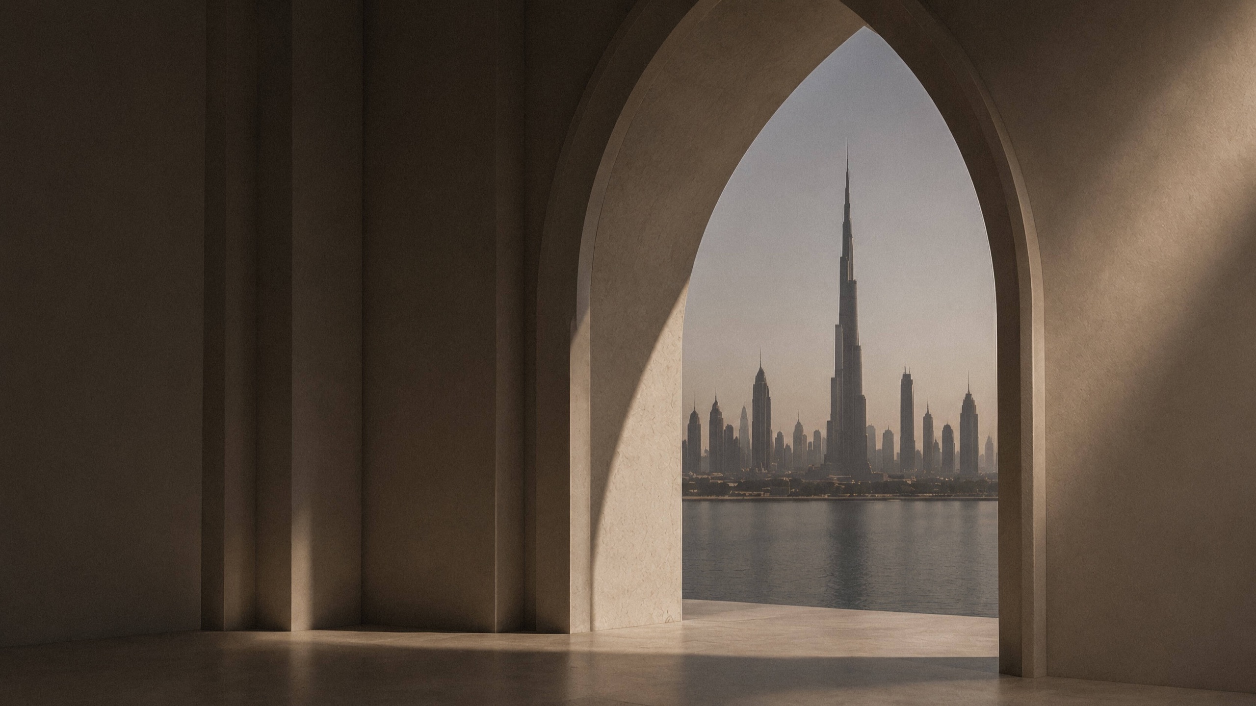 The Dubai skyline and Burj Khalifa framed by a stone arch at dusk