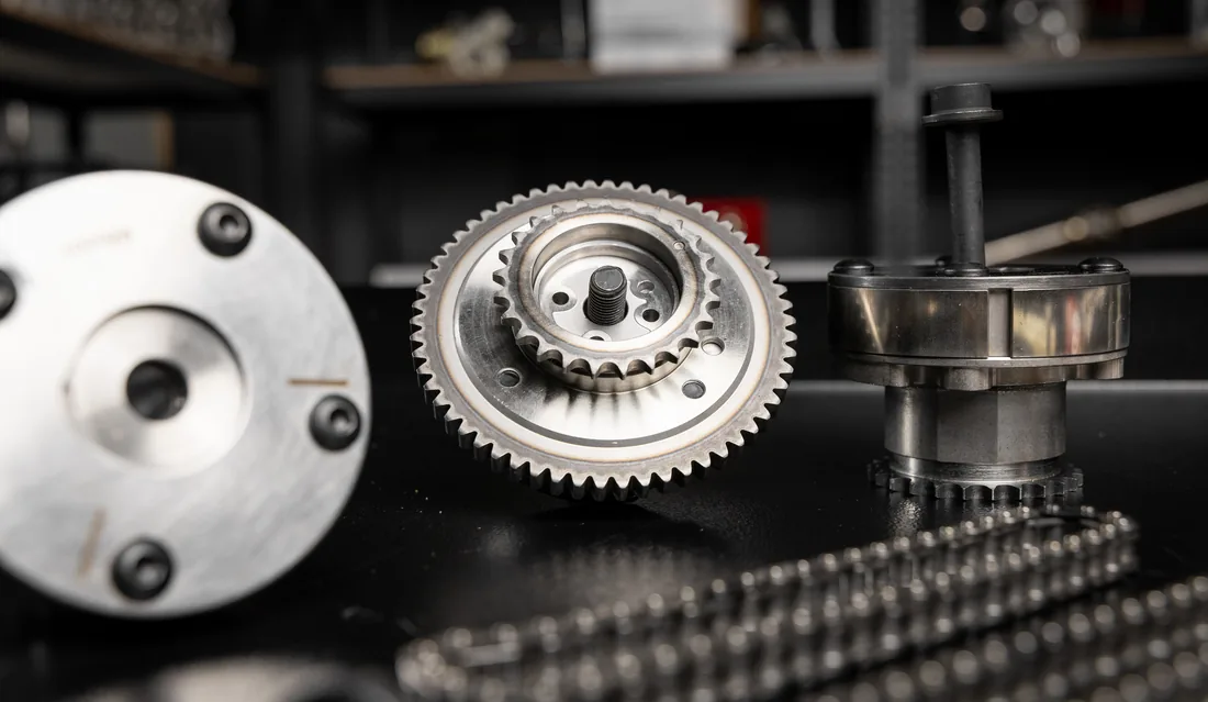 Timing chain and gear assembly on an engine