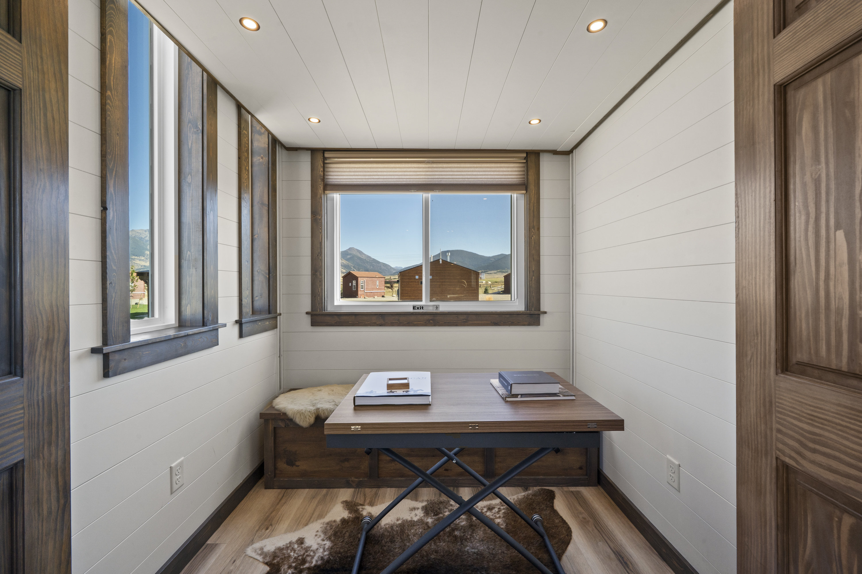 Royal Wulff table nook with a convertible table, bench seat and mountain views