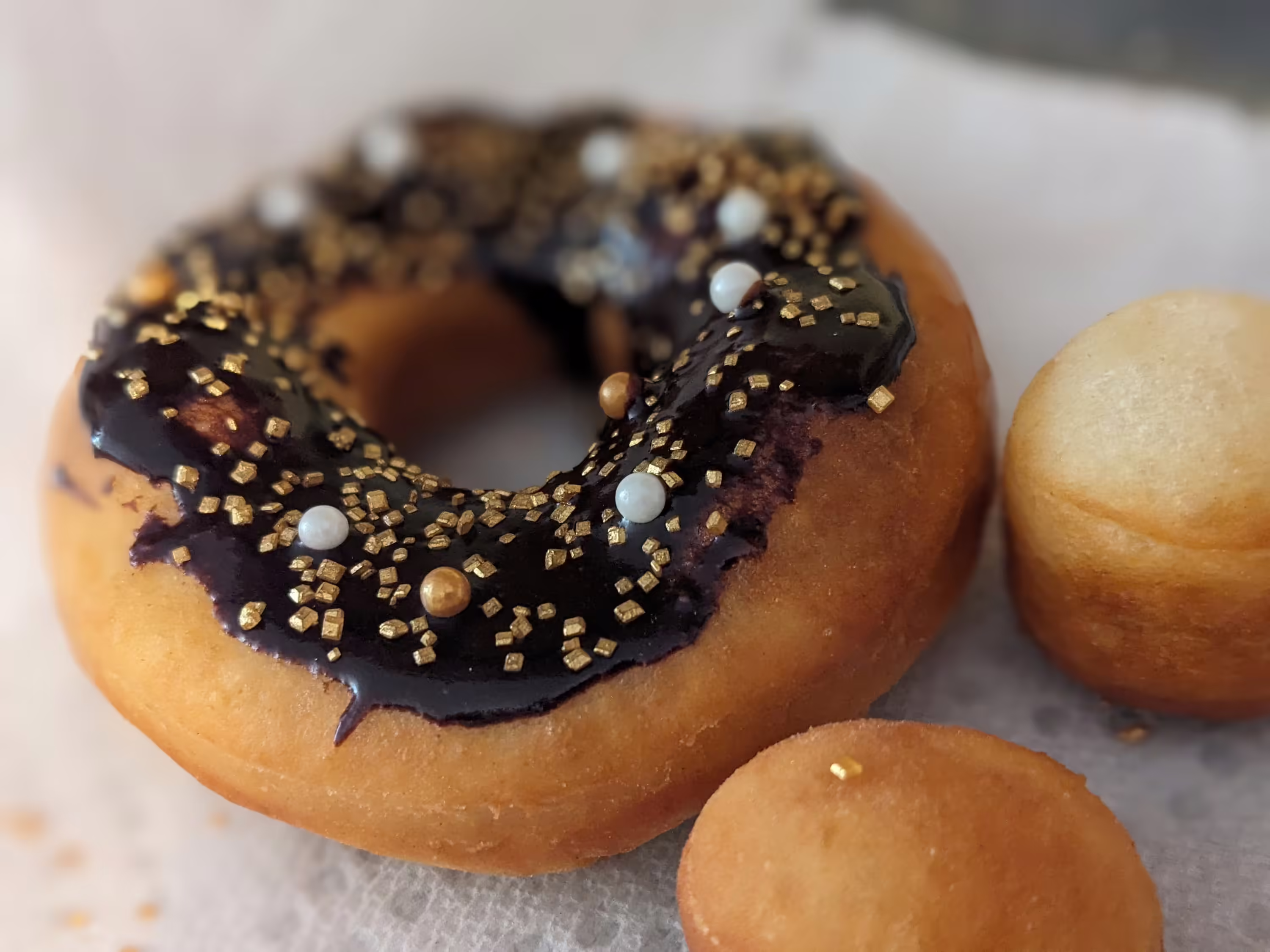 Freshly made donuts with chocolate glaze