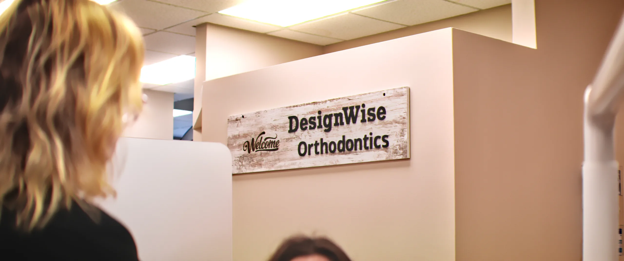 The DesignWise welcome sign inside the practice